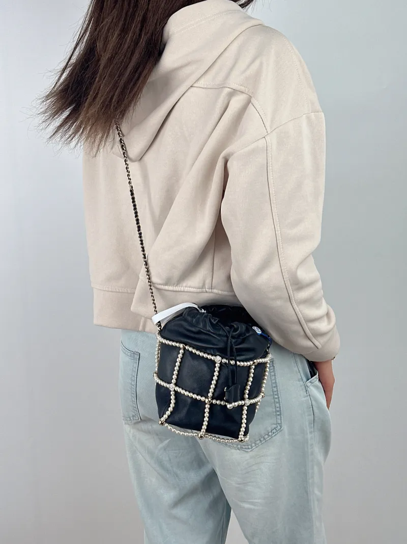 Chanel Shoulder Bag Pearl Bucket Bag Black Lambskin One Size 12 × 12 × 17.5 cm 30 — on-model view 1 of 2