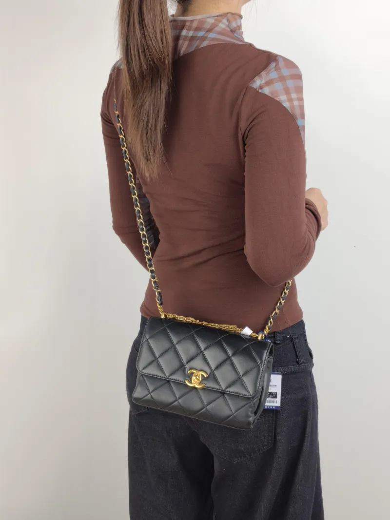 Chanel Crossbody Bag Crossbody Bag Black with Gold-Tone Hardware Lambskin Mini 20 × 6.5 × 13 cm — on-model view 3 of 3