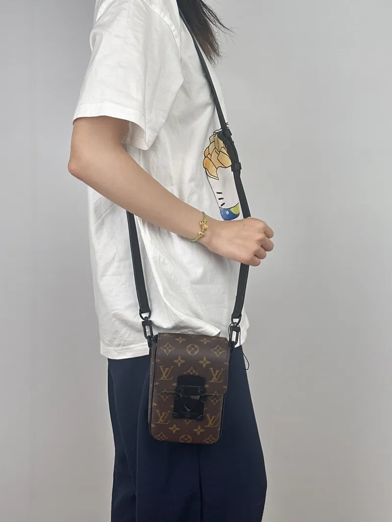 Louis Vuitton Crossbody Bag S-Lock Vertical Box Monogram PV Cmini12 × 7 × 19 cm — on-model view 1 of 2