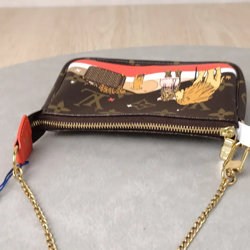 Louis Vuitton Clutch Mini Pochette Accessoires Monogram PVC Mini 15.5 × 4 × 10.5 cm — detail view 6 of 9