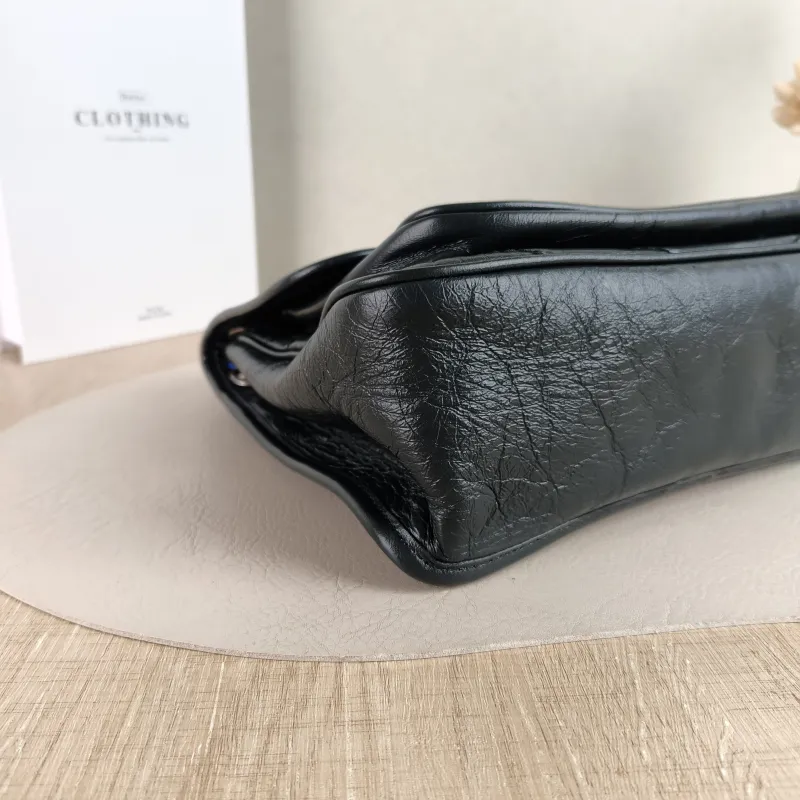 SAINT LAURENT Crossbody Bag Niki D Green Waxed Leather Medium 28 × 8.5 × 20 cm — detail view 10 of 13