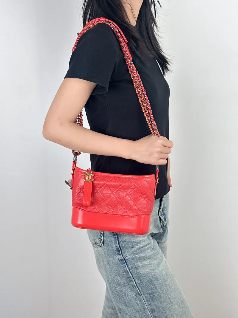 Chanel Crossbody Bag Gabrielle Gabrielle Bag Red CC alfskin Small20 × 8 × 15 cm — on-model view 2 of 2