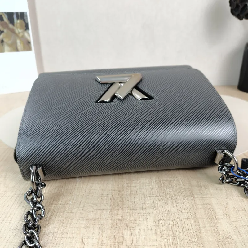 Louis Vuitton Crossbody Bag Twist Grey Calfskin Medium 23 × 9.5 × 17 cm — detail view 1 of 12