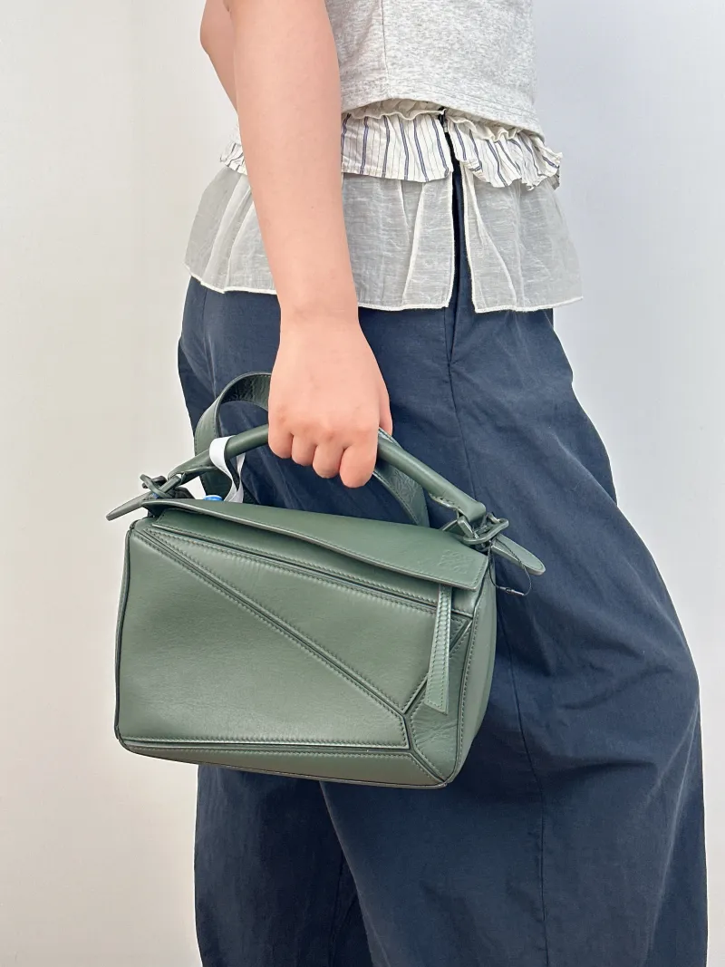 LOEWE Crossbody Bag Puzzle Green CC alfskin Small24 × 10.5 × 16.5 cm — on-model view 3 of 3