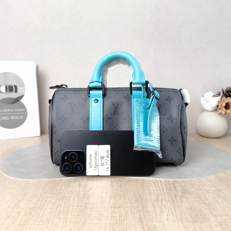 Louis Vuitton Crossbody Bag Keepall 25 Black · Blue PVC Medium 25 × 11 × 15 cm — cover view 4 of 6