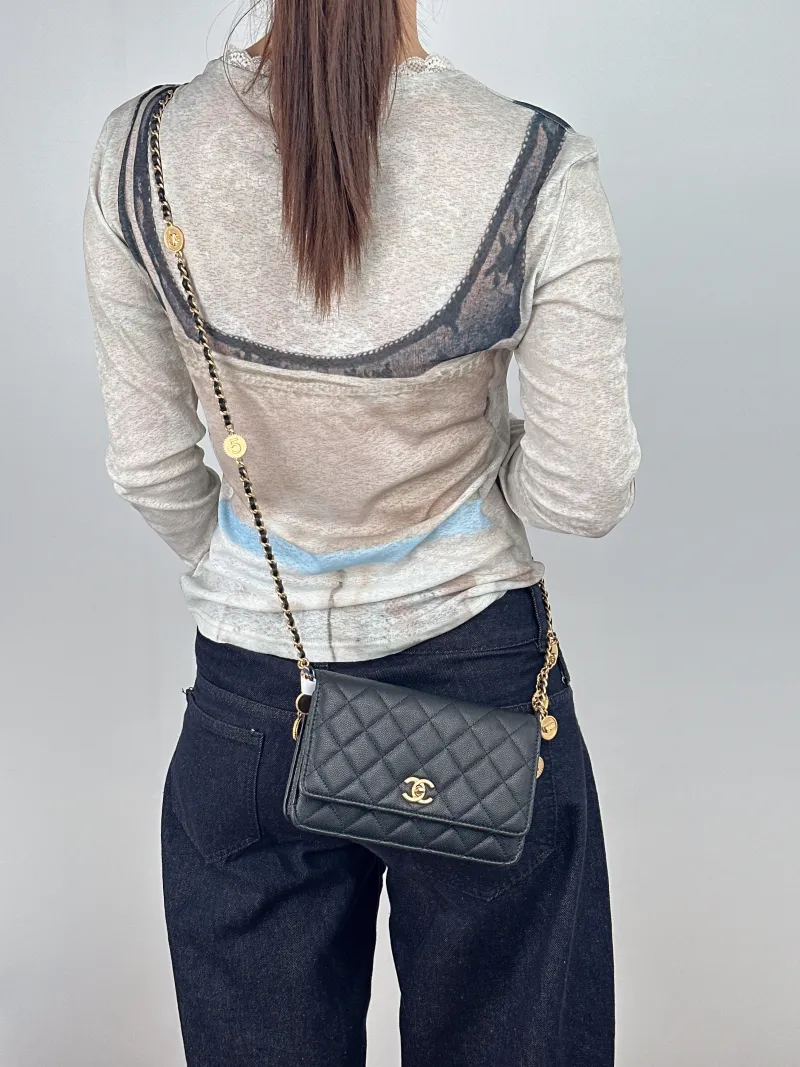 Chanel Crossbody Bag CF WOC Black Grained Calfskin One Size19.2 × 3.5 × 12.3 cm — on-model view 1 of 2
