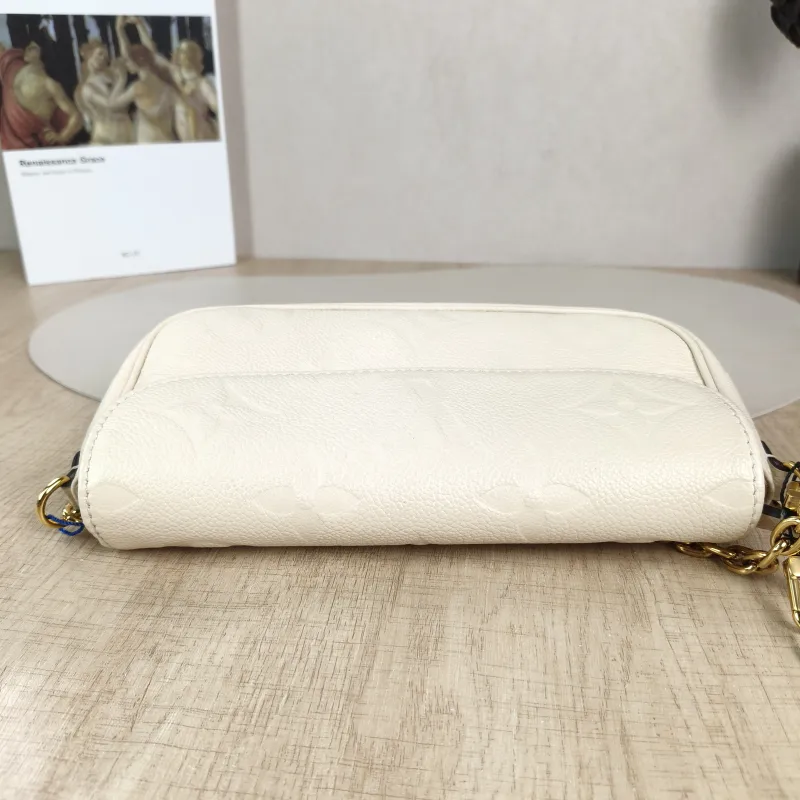 Louis Vuitton Crossbody Bag IVY White Monogram Empreinte Embossed Calfskin Small 23.5 × 4.3 × 12 cm — detail view 7 of 11