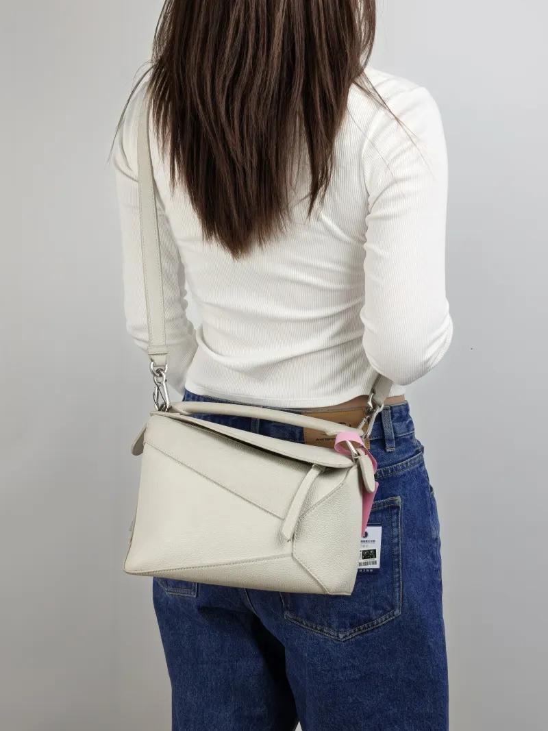 LOEWE Crossbody Bag Puzzle White CC alfskin Small 24 × 10.5 × 16.5 cm — on-model view 3 of 3