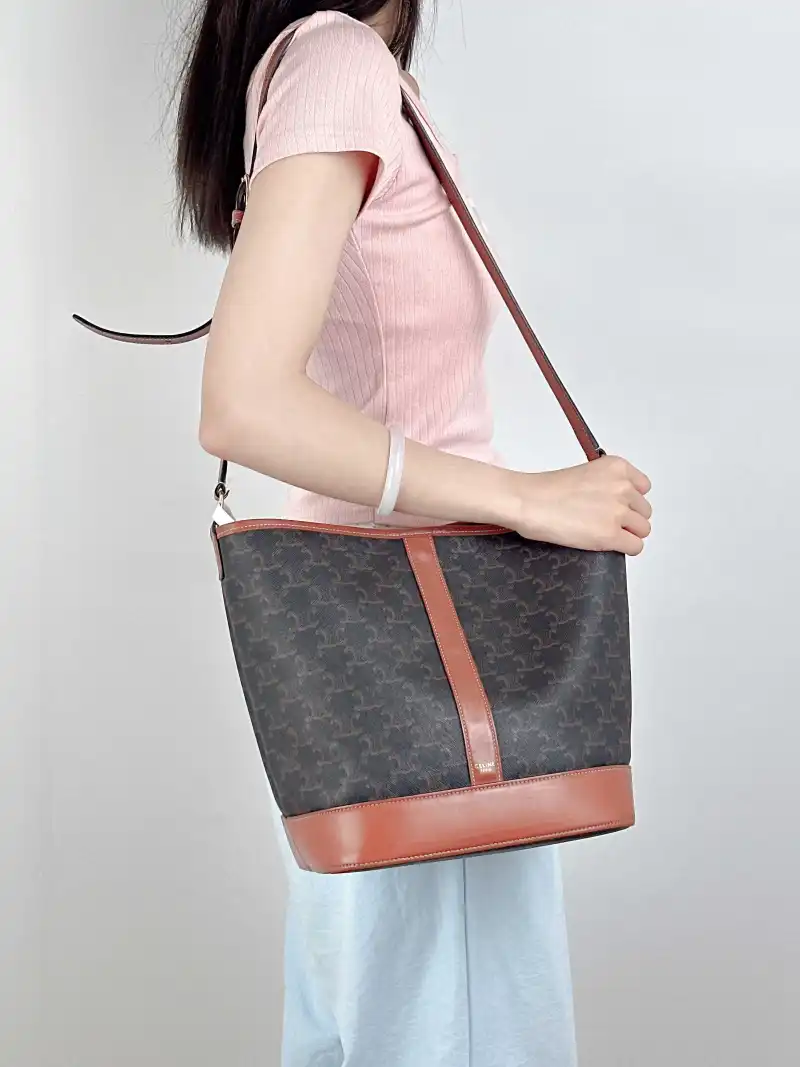 CELINE Crossbody Bag Triomphe Bucket Bag Monogram PVC Medium24 × 18 × 27 cm — on-model view 2 of 2