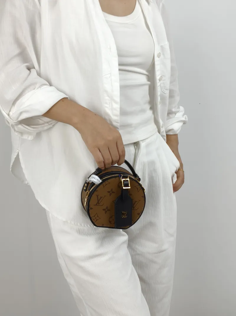 Louis Vuitton Crossbody Bag Mini BOITE CHAPEAU Monogram PVC Mini 13 × 6.5 × 12 cm — on-model view 2 of 2