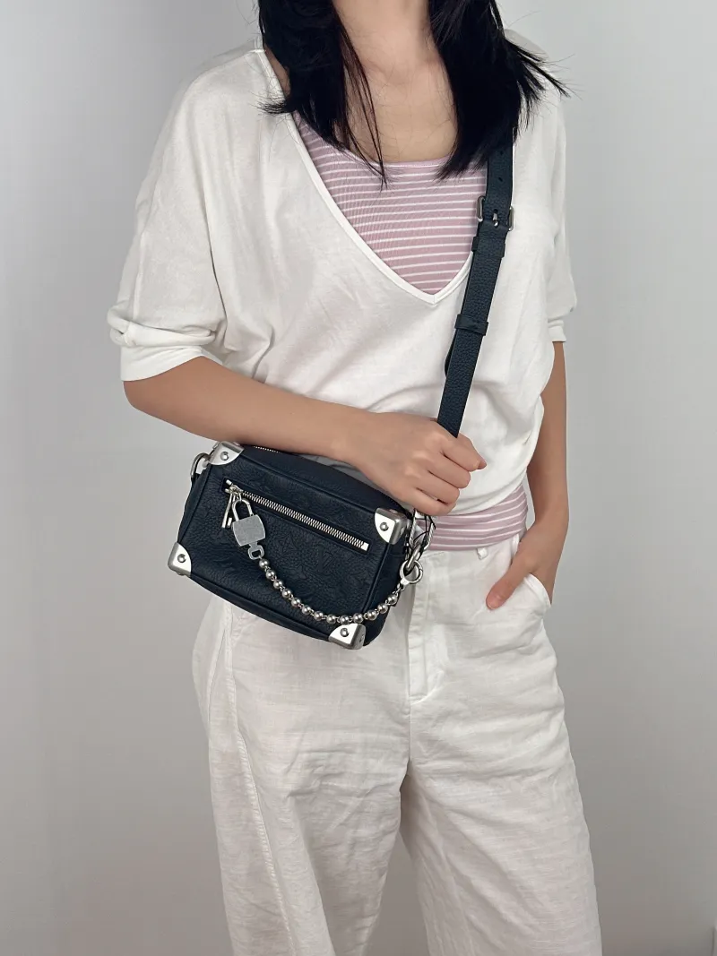 Louis Vuitton Crossbody Bag SOFT TRUNK Box Calfskin Mini 18.5 × 8 × 13 cm — on-model view 1 of 2