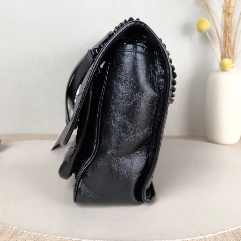 SAINT LAURENT Crossbody Bag Niki Black Waxed Leather Calfskin Medium 28 × 8.5 × 20 cm — detail view 5 of 14