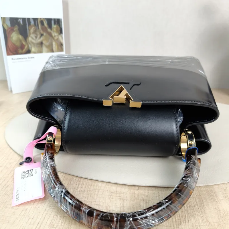 Louis Vuitton Top Handle Bag Capucines Black Calfskin Medium31.5 × 11 × 20 cm — detail view 12 of 13
