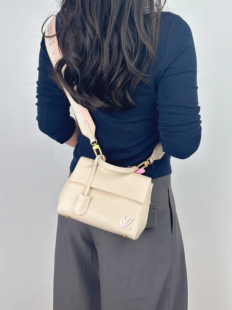 Louis Vuitton Crossbody Bag CLUNY White Epi Embossed Calfskin Mini 20 × 7.5 × 16 cm — on-model view 2 of 2