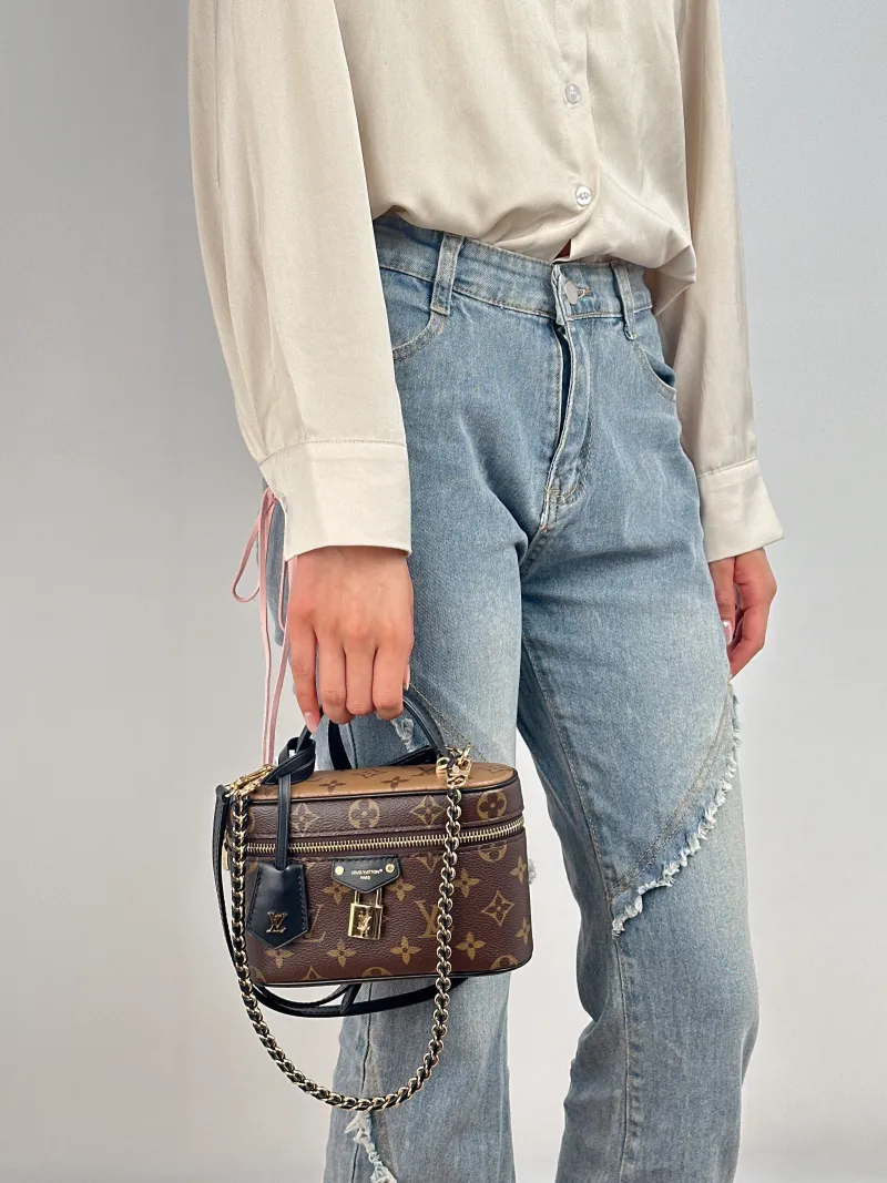 Louis Vuitton Shoulder Bag VANITY POUCH Cosmetic Bag Monogram PVC 19 × 6.5 × 11.5 cm — on-model view 2 of 2