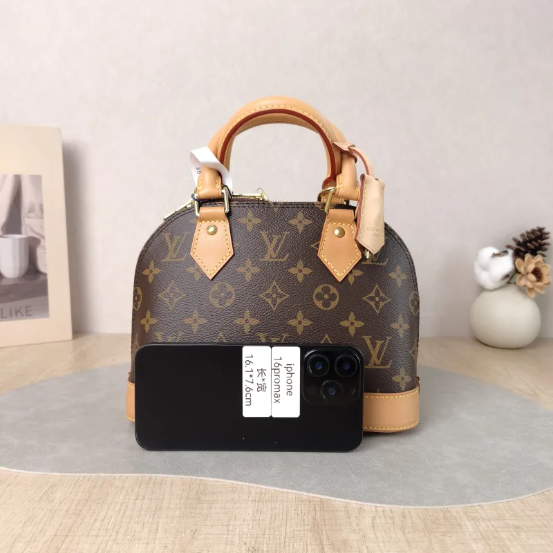 Louis Vuitton Crossbody Bag Alma BB Monogram PVC BB 23.5 × 11.5 × 17.5 cm — cover view 3 of 6