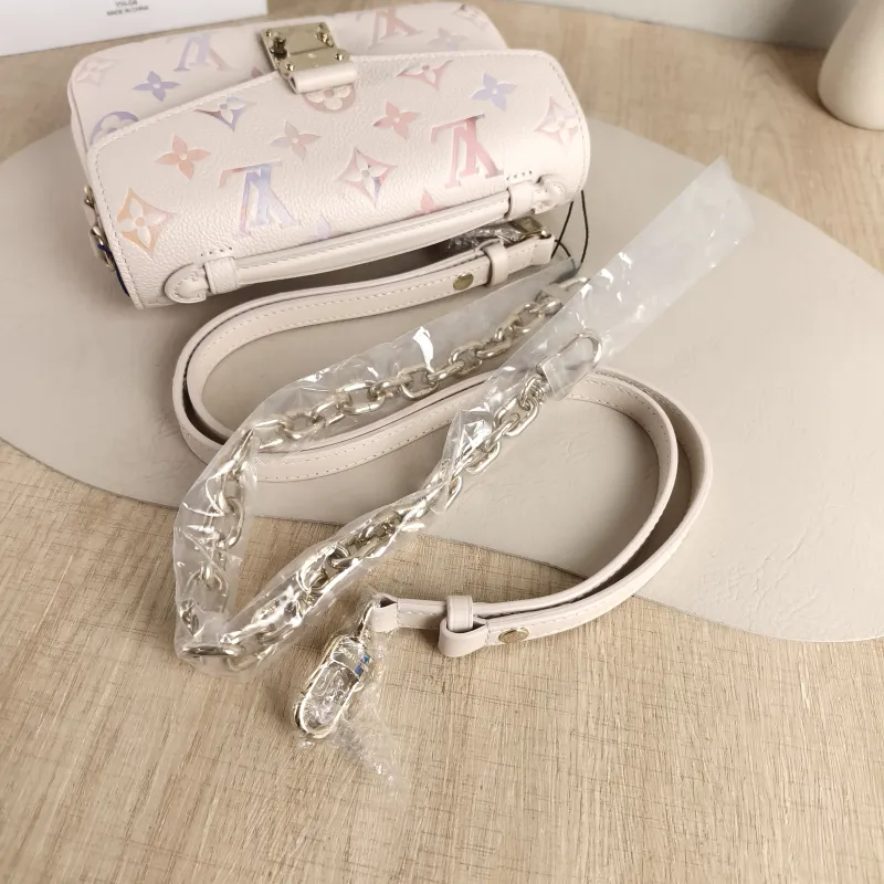 Louis Vuitton Crossbody Bag Pochette Métis East West Empreinte Embossed Calfskin Small 21.5 × 6 × 13.5 cm — detail view 12 of 13