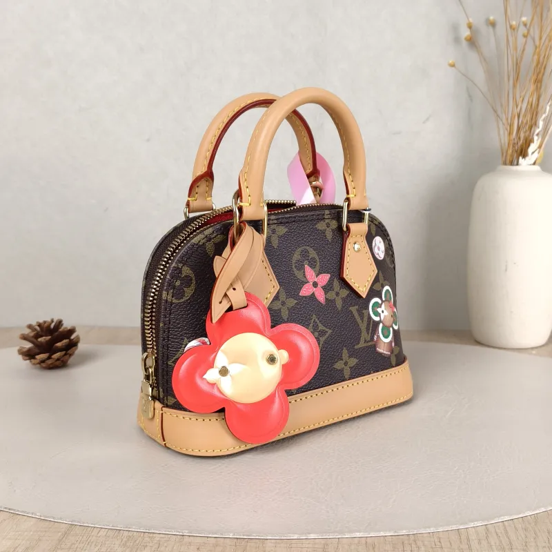 Louis Vuitton Crossbody Bag Alma Nano vivenne Monogram PVC nano 18 × 8 × 12 cm — cover view 4 of 5