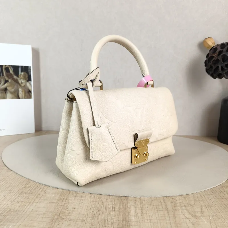 Louis Vuitton Crossbody Bag MADELEINE Beige Monogram Empreinte Embossed Calfskin BB 24 × 8.5 × 17 cm — cover view 5 of 5