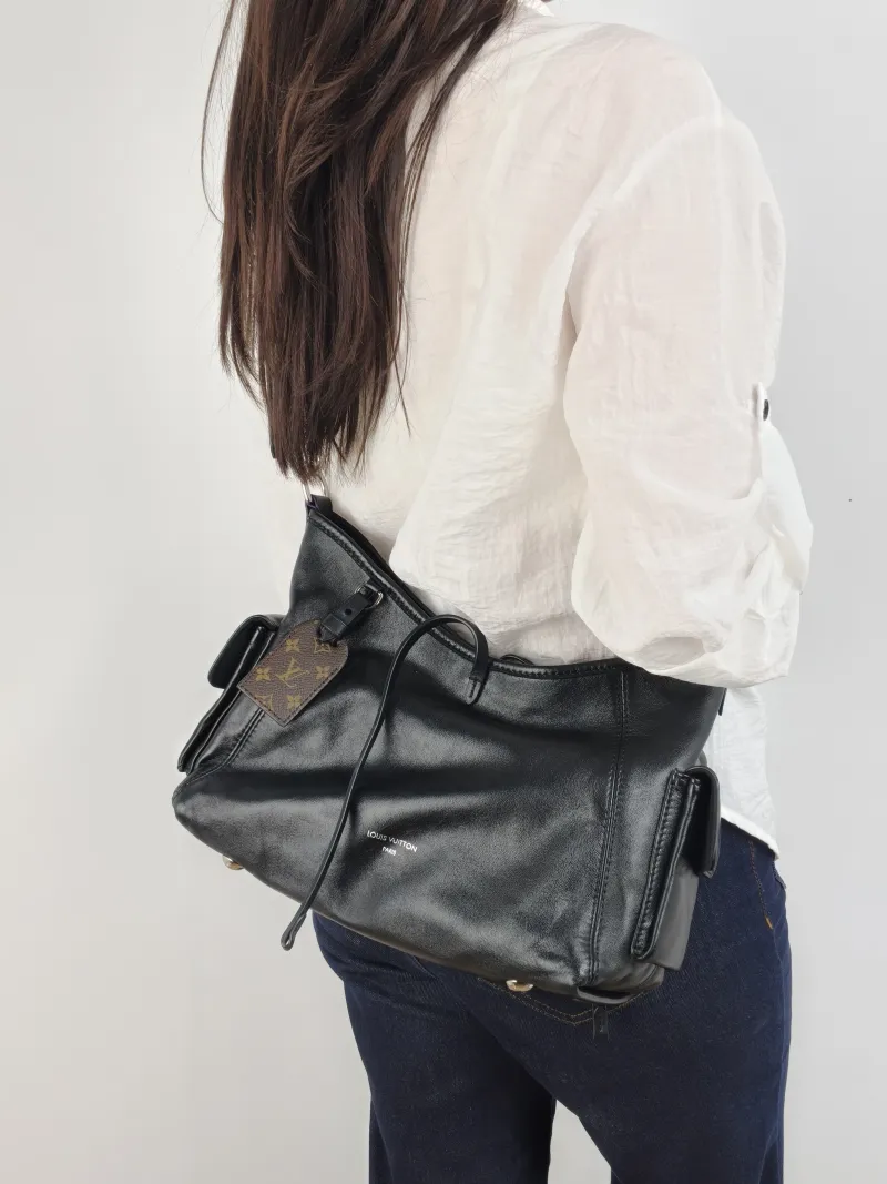 Louis Vuitton Crossbody Bag Carryall Cargo Vibe Black SL ambskin Small 33.5 × 15 × 23 cm — on-model view 2 of 2