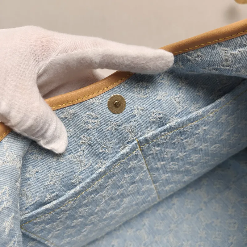 Louis Vuitton Crossbody Bag Carryall Blue Small 29 × 12 × 24 cm — detail view 9 of 14