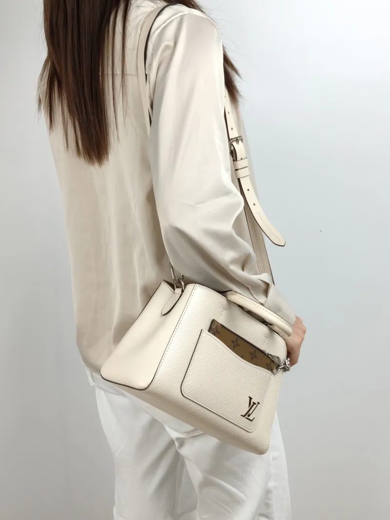Louis Vuitton Crossbody Bag Marelle Tote Top Handle Bag White Epi Embossed Calfskin BB 25 × 11 × 17 cm — on-model view 1 of 3