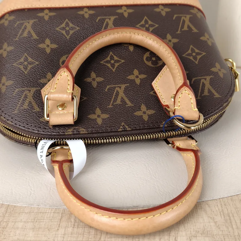 Louis Vuitton Crossbody Bag Alma BB Monogram PVCBB23.5 × 11.5 × 17.5 cm — detail view 8 of 14