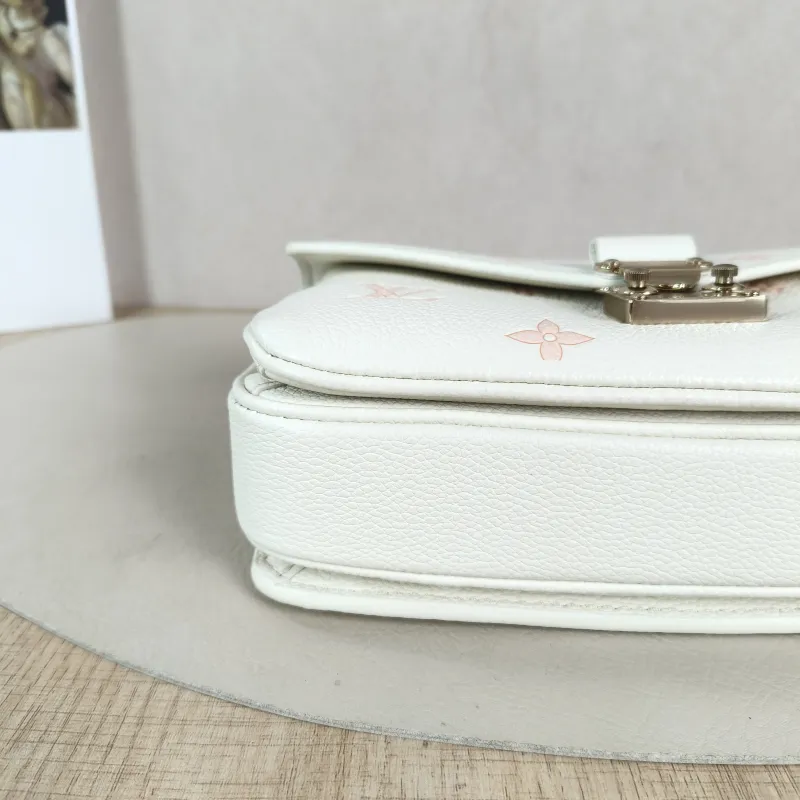 Louis Vuitton Crossbody Bag Pochette Métis East West White · Pink Monogram Empreinte Embossed Calfskin Small 21.5 × 6 × 13.5 cm — detail view 11 of 13