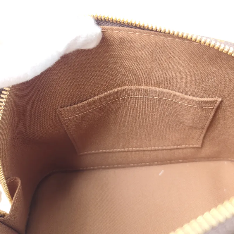 Louis Vuitton Crossbody Bag Alma BB Monogram PVC BB 23.5 × 11.5 × 17.5 cm — detail view 11 of 12