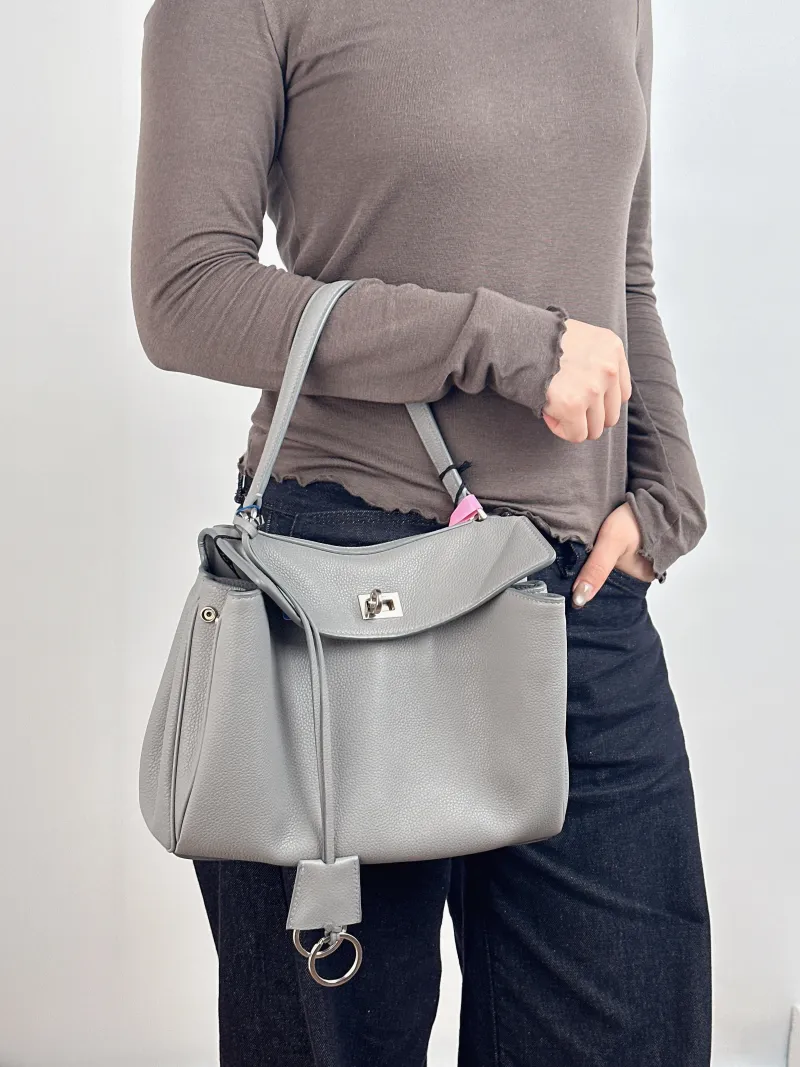 BALENCIAGA Crossbody Bag RODEO Grey Calfskin Small 27 × 10 × 20 cm — on-model view 1 of 2