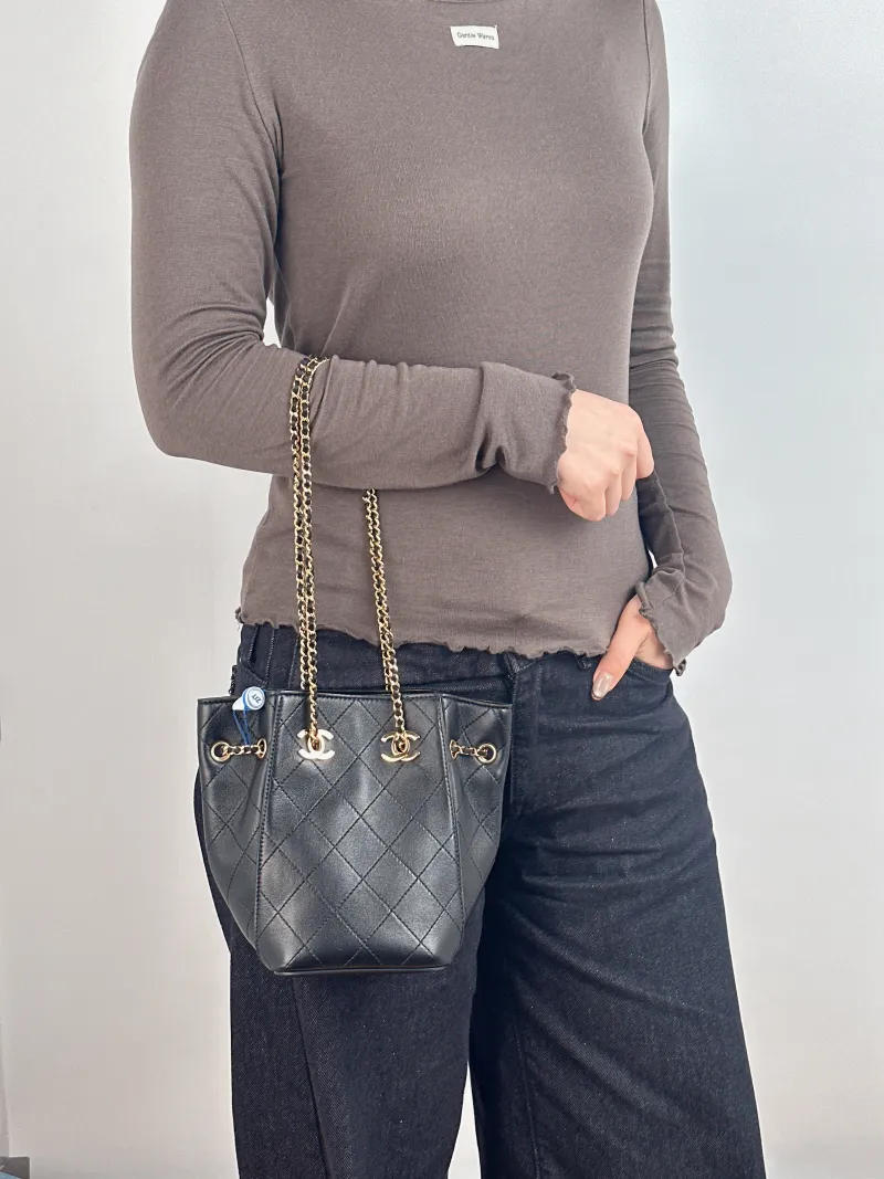 Chanel Shoulder Bag Bucket Bag Black Lambskin One Size 11 × 11 × 17.5 cm — on-model view 2 of 2