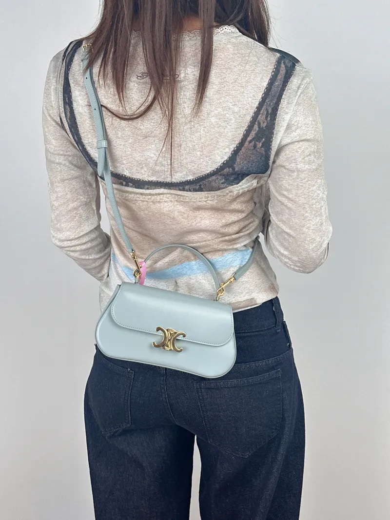 CELINE Crossbody Bagteen lola Crossbody Bag Blue Calfskin20 × 8.5 × 11.5 cm — on-model view 2 of 3