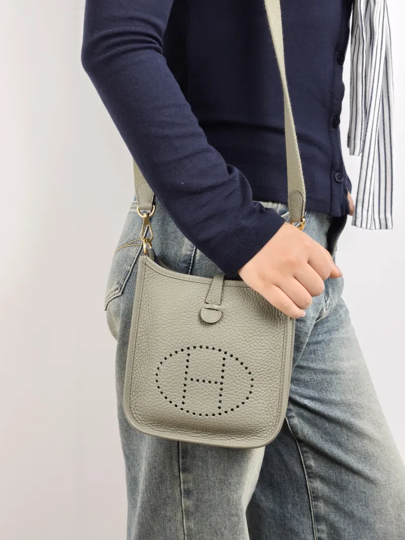 Hermès Crossbody Bag Evelyne Mini 16 Mini 16 TC Calfskin Mini 17 × 5.5 × 18 cm B — on-model view 1 of 2
