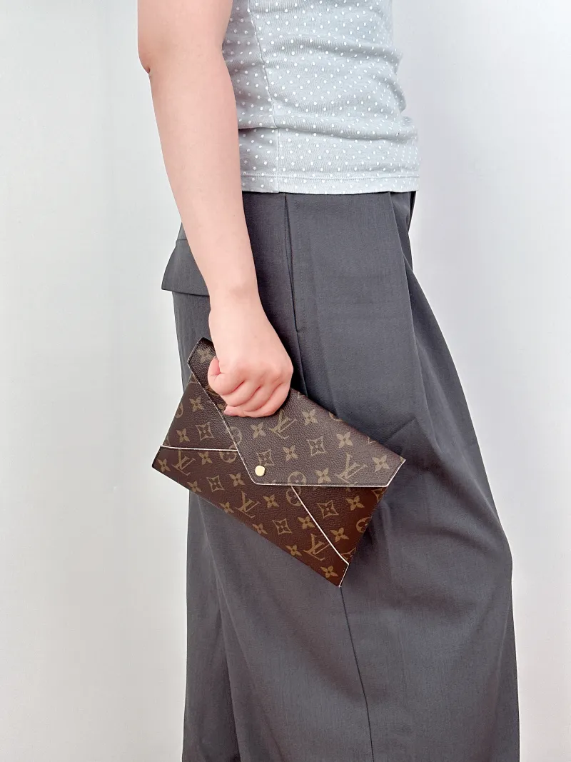 Louis Vuitton Clutch Kirigami Pochette Clutch Monogram PVC Large23 × 0.3 × 16.5 cm — on-model view 2 of 2