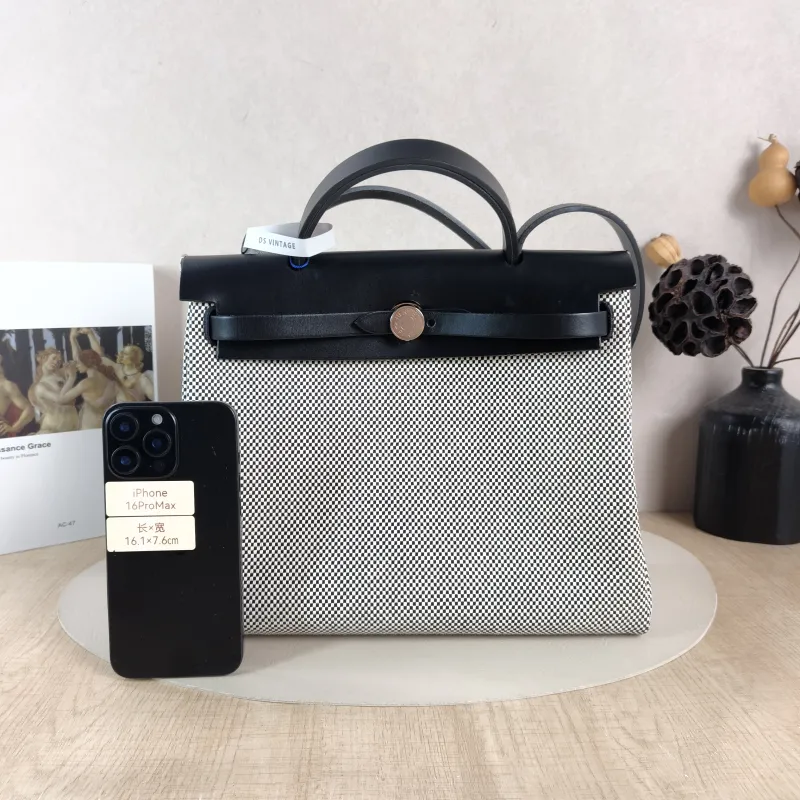 Hermès Crossbody Bag Herbag 31 Black · White Canvas Medium 30.5 × 11 × 25.5 cm u — cover view 2 of 6