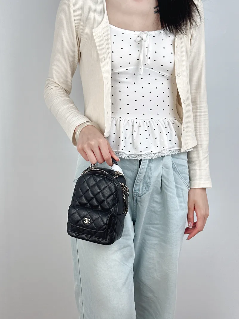 Chanel Backpack mini Backpack Collection Black Calfskin One Size13 × 9 × 18 cm — on-model view 1 of 3