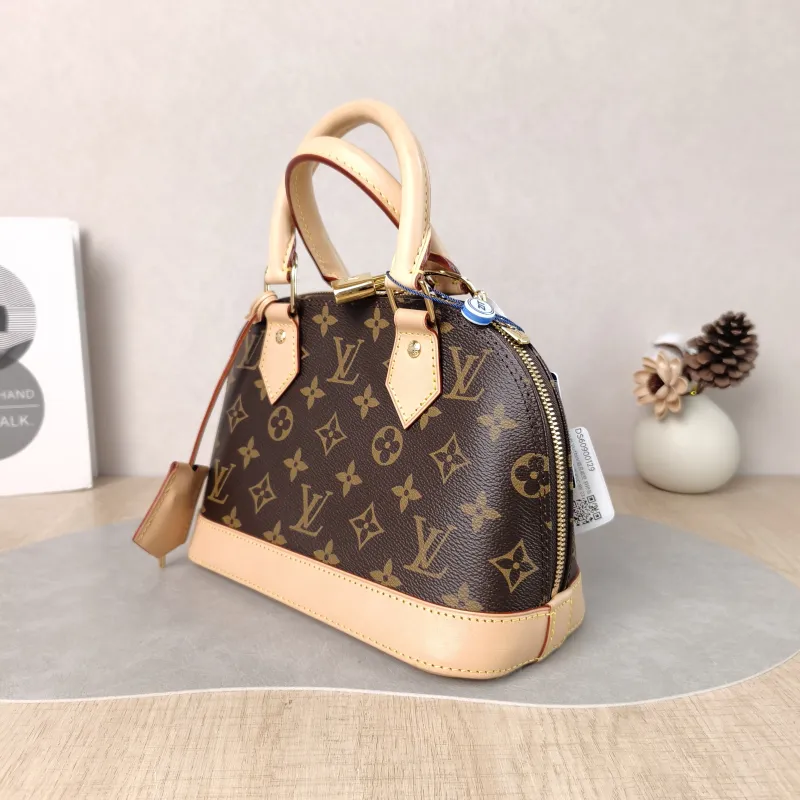 Louis Vuitton Crossbody Bag Alma BB Monogram PVC BB 23.5 × 11.5 × 17.5 cm — cover view 4 of 5