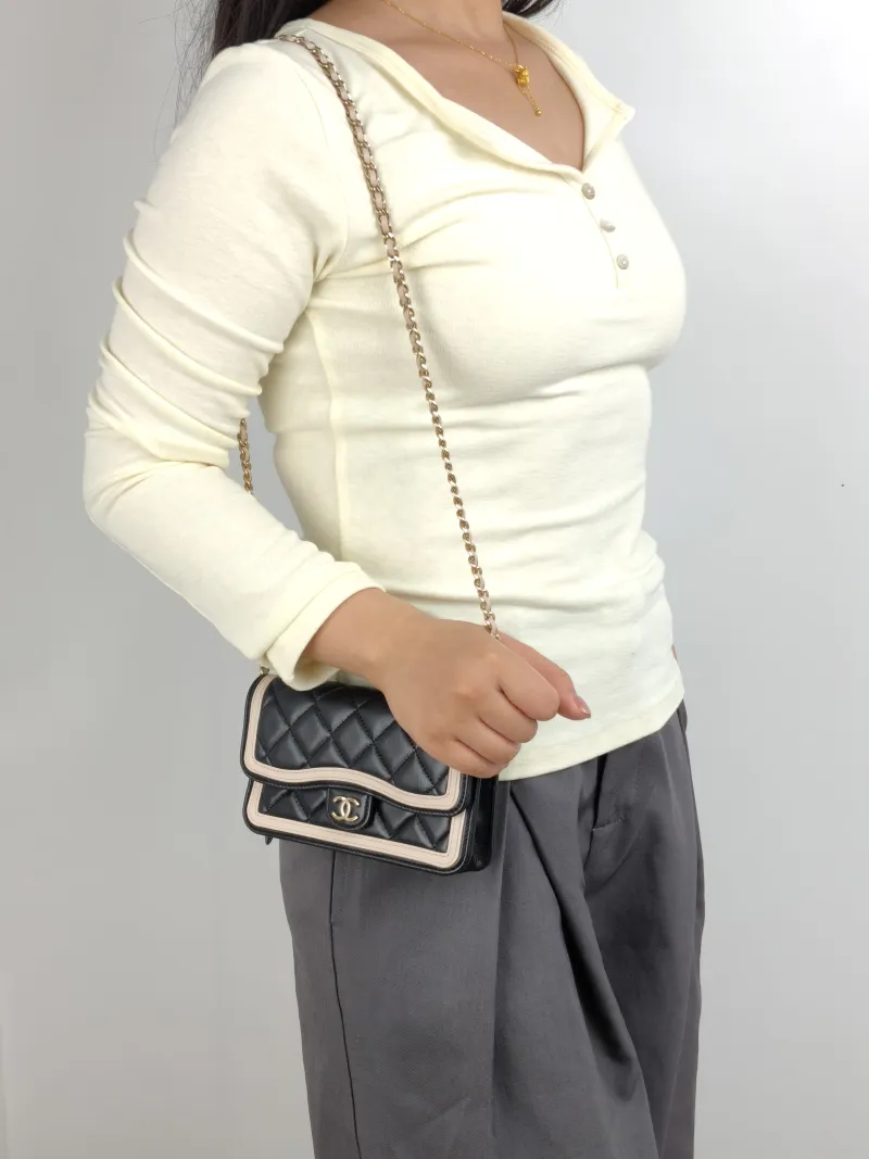 Chanel Crossbody Bag CF Mini WOC Crossbody Bag Black Pink Lambskin One Size 17 × 4 × 10 cm — on-model view 2 of 2
