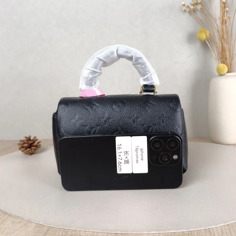 Louis Vuitton Crossbody Bag MADELEINE Black Monogram Empreinte Embossed Calfskin nano 21 × 6 × 12.5 cm — cover view 2 of 5