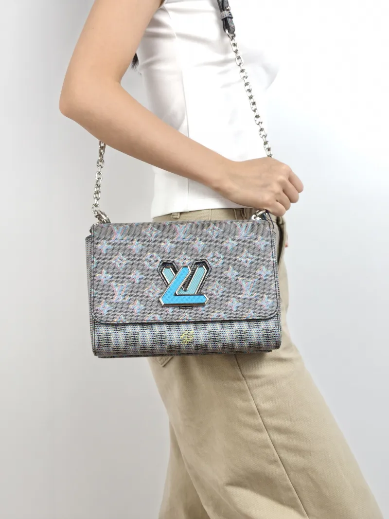 Louis Vuitton Crossbody Bag Twist Blue PVC Medium 23 × 9.5 × 17 cm — on-model view 1 of 2