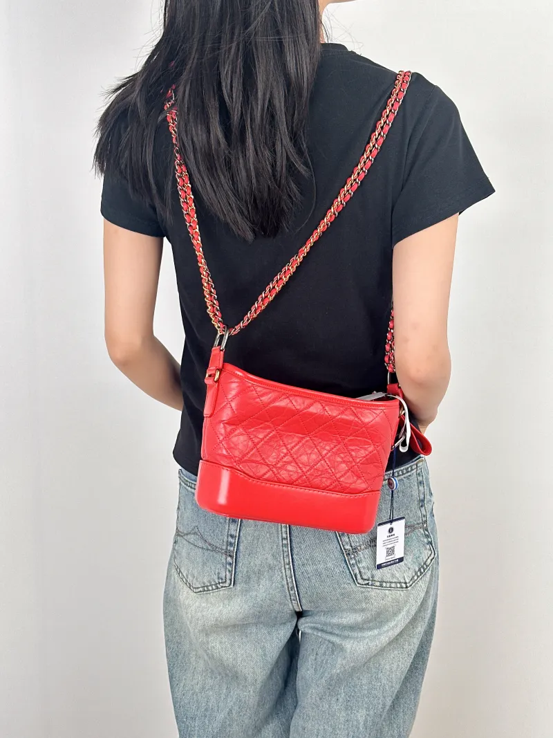 Chanel Crossbody Bag Gabrielle Gabrielle Bag Red CC alfskin Small20 × 8 × 15 cm — on-model view 1 of 2