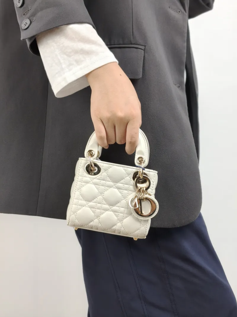 DIOR Crossbody Bag Lady Lady Dior Bag White Lambskin Mini 12 × 5 × 10 cm — on-model view 1 of 2