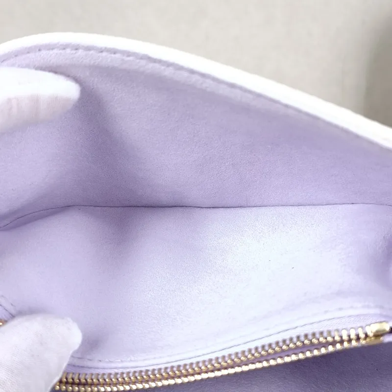 Louis Vuitton Crossbody Bag Pochette Métis East West White · Monogram Empreinte Embossed Calfskin Small 21.5 × 6 × 13.5 cm — detail view 4 of 15