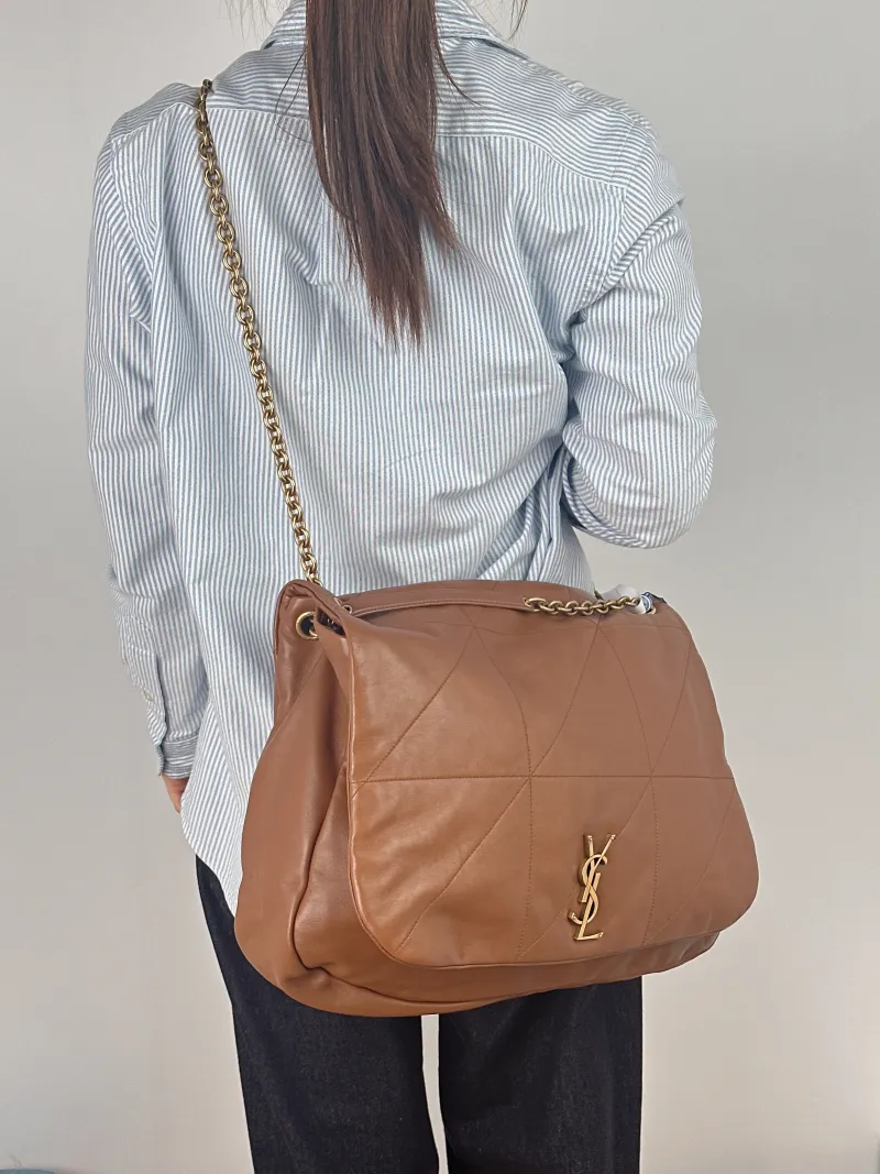 SAINT LAURENT Crossbody Bag Jamie 4.3 Chain Bag Lambskin Large 43 × 9 × 29 cm — on-model view 2 of 2