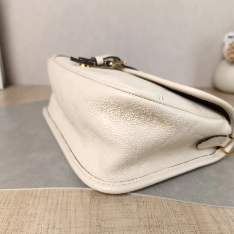 Louis Vuitton Crossbody Bag Diane Baguette Bag White Monogram Empreinte Embossed Calfskin Small 24 × 9 × 15 cm — detail view 2 of 11