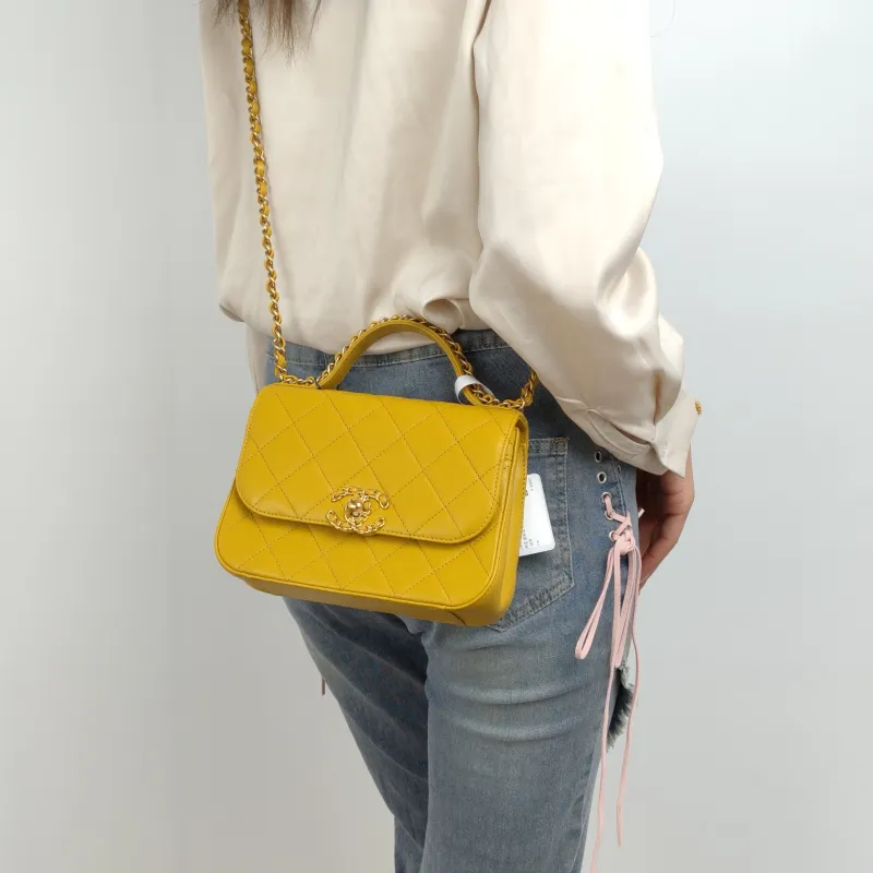 Chanel Crossbody Bag Top Handle Crossbody Bag Yellow Calfskin 20 × 6 × 14 cm 28 — on-model view 1 of 2