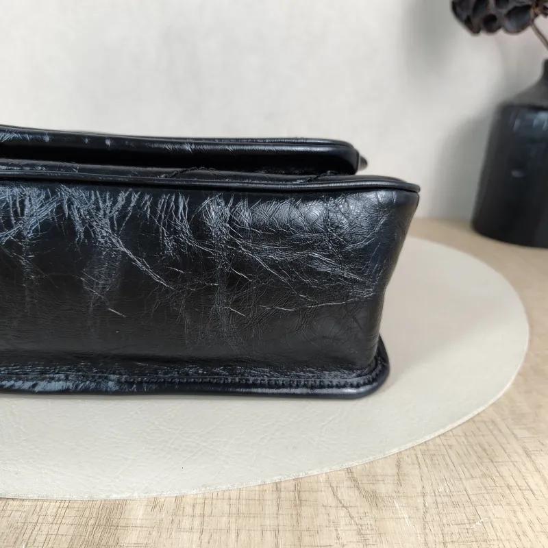 SAINT LAURENT Crossbody Bag Niki D Waxed Leather Calfskin Medium 28 × 8.5 × 20 cm — detail view 12 of 12
