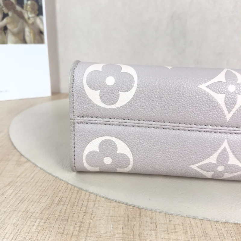 Louis Vuitton Crossbody Bag Onthego East West Two Straps Grey Monogram Empreinte Embossed Calfskin Small 25 × 10 × 13 cm — detail view 2 of 12