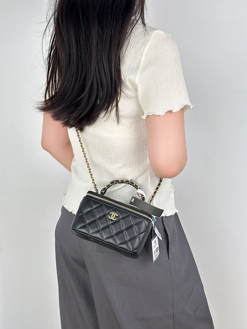 Chanel Crossbody Bag Edition Black Grained Calfskinmini16 × 8 × 9.5 cm — on-model view 1 of 3