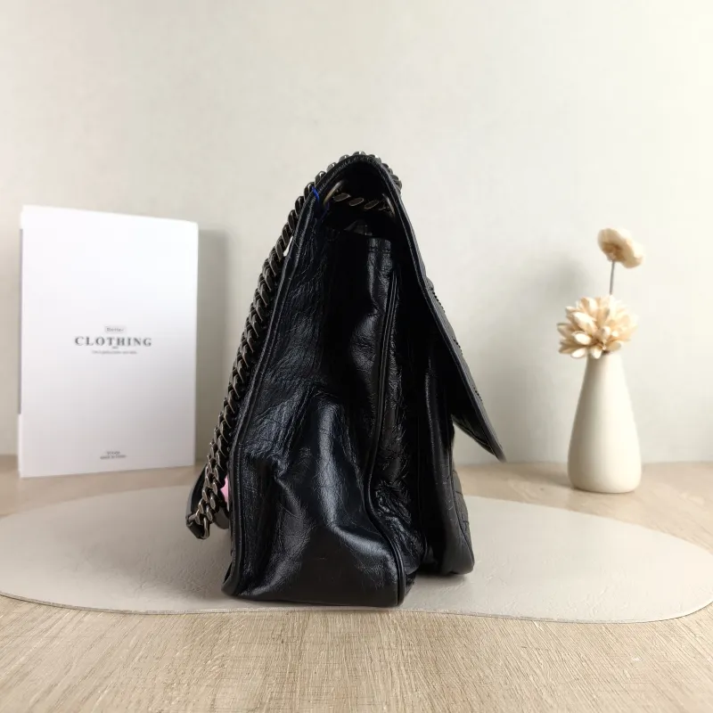 SAINT LAURENT Crossbody Bag Niki Black Calfskin Large 32 × 9 × 23 cm — detail view 10 of 13